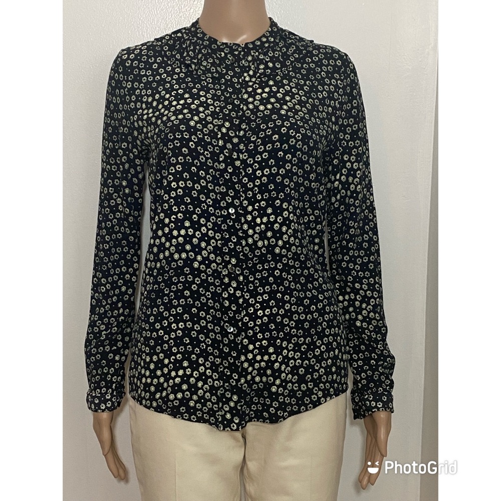 A.P.C Long sleeve blouse in black and white print. Ruffled trim at band collar.